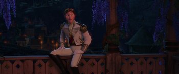Movie still from “Frozen” (2013), directed by Jennifer Lee – A man sitting on top of a wooden railing; Medium shot, Over the shoulder angle