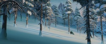 Movie still from “Frozen” (2013), directed by Jennifer Lee – An animated scene of trees and a person on a sled; Extreme Wide shot, High angle