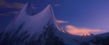 Movie still from “Frozen” (2013), directed by Jennifer Lee – A view of a snowy mountain with a sky background; Extreme Wide shot, Low angle
