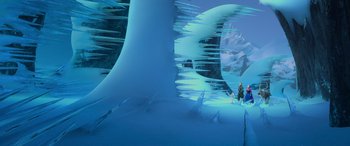 Movie still from “Frozen” (2013), directed by Jennifer Lee – A couple of people standing on top of a snow covered slope; Extreme Wide shot, High angle