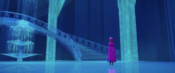 Movie still from “Frozen” (2013), directed by Jennifer Lee – A woman in a purple coat standing in front of a staircase; Extreme Wide shot, Over the shoulder angle
