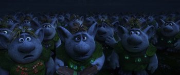 Movie still from “Frozen” (2013), directed by Jennifer Lee – A bunch of people that are in the grass; Medium shot, High angle