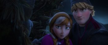 Movie still from “Frozen” (2013), directed by Jennifer Lee – Two people standing next to each other near a tree; Close Up shot, Over the shoulder angle