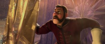 Movie still from “Frozen” (2013), directed by Jennifer Lee – A man in a red jacket is holding a sword in his hand; Medium shot, Low angle