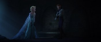 Movie still from “Frozen” (2013), directed by Jennifer Lee – A man and a woman are standing next to each other in the dark; Wide shot, Over the shoulder angle
