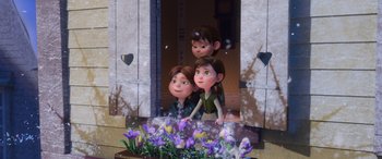 Movie still from “Frozen” (2013), directed by Jennifer Lee – A group of three kids standing next to each other in front of flowers; Wide shot, High angle