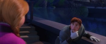 Movie still from “Frozen” (2013), directed by Jennifer Lee – A woman sitting on a ledge in front of a pool; Medium shot, Over the shoulder angle