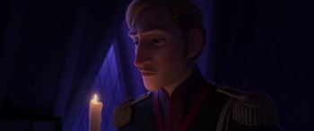 Movie still from “Frozen II” (2019), directed by Jennifer Lee – A person holding a candle in a dark room; Close Up shot, Over the shoulder angle