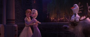 Movie still from “Frozen II” (2019), directed by Jennifer Lee – A couple of people standing next to each other in a room; Medium shot, Over the shoulder angle