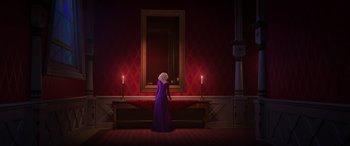 Movie still from “Frozen II” (2019), directed by Jennifer Lee – A woman standing in front of a mirror in a room; Wide shot, Over the shoulder angle