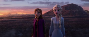 Movie still from “Frozen II” (2019), directed by Jennifer Lee – Two animated characters standing next to each other in a field; Medium shot, Over the shoulder angle