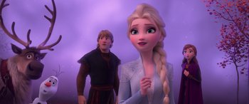 Movie still from “Frozen II” (2019), directed by Jennifer Lee – A man and a woman standing next to each other in front of a purple background; Medium shot, Over the shoulder angle