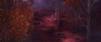 Movie still from “Frozen II” (2019), directed by Jennifer Lee – A person walking through a forest with red leaves; Extreme Wide shot, High angle
