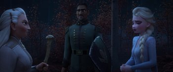 Movie still from “Frozen II” (2019), directed by Jennifer Lee – A man in a military uniform holding a shield; Medium shot, Over the shoulder angle