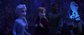 Movie still from “Frozen II” (2019), directed by Jennifer Lee – A group of people standing next to each other in the dark; Medium shot, Over the shoulder angle