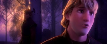 Movie still from “Frozen II” (2019), directed by Jennifer Lee – A person's face with trees in the background; Close Up shot, Over the shoulder angle