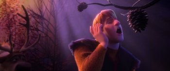 Movie still from “Frozen II” (2019), directed by Jennifer Lee – A man with his mouth open and his hand to his ear; Close Up shot, Low angle