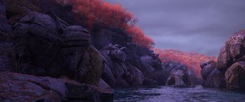 Movie still from “Frozen II” (2019), directed by Jennifer Lee – A body of water surrounded by rocks and trees; Extreme Wide shot, High angle