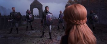 Movie still from “Frozen II” (2019), directed by Jennifer Lee – A group of people in a field with swords and shields; Wide shot, Over the shoulder angle