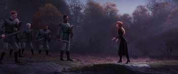Movie still from “Frozen II” (2019), directed by Jennifer Lee – A man and a woman are standing in a field; Wide shot, Over the shoulder angle