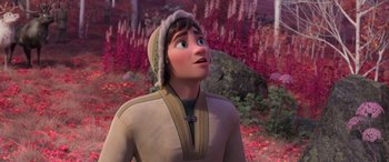 Movie still from “Frozen II” (2019), directed by Jennifer Lee – A woman in a hat looking up at something; Medium shot, Over the shoulder angle
