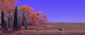 Movie still from “Frozen II” (2019), directed by Jennifer Lee – An image of an image of a field with trees in the background; Extreme Wide shot, Low angle