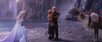 Movie still from “Frozen II” (2019), directed by Jennifer Lee – A couple of people standing next to a body of water; Wide shot, Over the shoulder angle