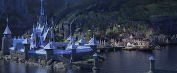 Movie still from “Frozen II” (2019), directed by Jennifer Lee – An artistic rendering of a bridge and a town on the water; Extreme Wide shot, High angle