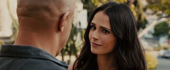Movie still from “Furious 7” (2015), directed by James Wan – A man and a woman talking to each other; Close Up shot, Over the shoulder angle