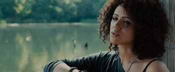 Movie still from “Furious 7” (2015), directed by James Wan – A person near a body of water; Close Up shot, Over the shoulder angle