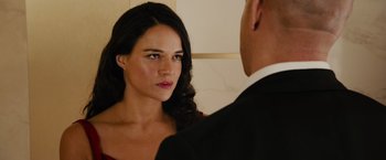 Movie still from “Furious 7” (2015), directed by James Wan – A man and a woman looking at one another; Close Up shot, Over the shoulder angle