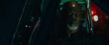 Movie still from “Furious 7” (2015), directed by James Wan – A black man with a beard and a mustache; Close Up shot, Low angle