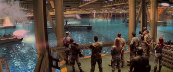 Movie still from “G.I. Joe: The Rise of Cobra” (2009), directed by Stephen Sommers – A group of people standing in front of a body of water; Extreme Wide shot, High angle