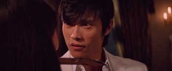 Movie still from “G.I. Joe: The Rise of Cobra” (2009), directed by Stephen Sommers – A person holding a knife; Close Up shot, Over the shoulder angle