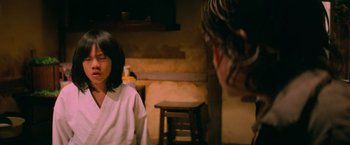 Movie still from “G.I. Joe: The Rise of Cobra” (2009), directed by Stephen Sommers – A woman in a white shirt and a man in a white shirt; Close Up shot, Over the shoulder angle