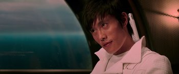 Movie still from “G.I. Joe: The Rise of Cobra” (2009), directed by Stephen Sommers – A young man with short black hair is looking at the camera; Close Up shot, Low angle