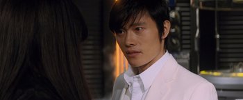 Movie still from “G.I. Joe: The Rise of Cobra” (2009), directed by Stephen Sommers – A man in a white shirt and a white tie; Close Up shot, Over the shoulder angle