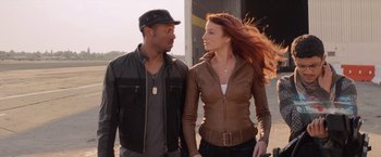 Movie still from “G.I. Joe: The Rise of Cobra” (2009), directed by Stephen Sommers – A man and a woman standing next to each other; Medium shot, Over the shoulder angle