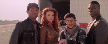 Movie still from “G.I. Joe: The Rise of Cobra” (2009), directed by Stephen Sommers – A group of people standing next to each other on the street; Medium shot, Low angle