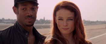 Movie still from “G.I. Joe: The Rise of Cobra” (2009), directed by Stephen Sommers – A man standing next to a beautiful woman; Close Up shot, Over the shoulder angle