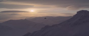 Movie still from “G.I. Joe: The Rise of Cobra” (2009), directed by Stephen Sommers – An airplane is flying over a mountain range; Extreme Wide shot, High angle