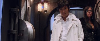Movie still from “G.I. Joe: The Rise of Cobra” (2009), directed by Stephen Sommers – A man in a white shirt standing in front of a mirror; Close Up shot, Low angle