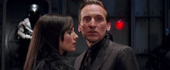 Movie still from “G.I. Joe: The Rise of Cobra” (2009), directed by Stephen Sommers – A man and a woman standing next to each other; Close Up shot, Low angle