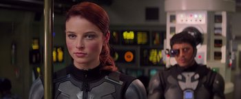 Movie still from “G.I. Joe: The Rise of Cobra” (2009), directed by Stephen Sommers – A person wearing a costume; Close Up shot, Over the shoulder angle