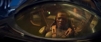 Movie still from “G.I. Joe: The Rise of Cobra” (2009), directed by Stephen Sommers – A man in a helmet looking into a mirror; Close Up shot, High angle