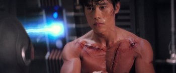 Movie still from “G.I. Joe: The Rise of Cobra” (2009), directed by Stephen Sommers – A man with a cut on his arm and chest; Close Up shot, Low angle