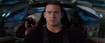 Movie still from “G.I. Joe: The Rise of Cobra” (2009), directed by Stephen Sommers – A person in a car; Close Up shot, High angle