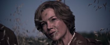 Movie still from “All the Money in the World” (2017), directed by Ridley Scott – A person with short hair; Close Up shot, Low angle