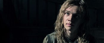 Movie still from “All the Money in the World” (2017), directed by Ridley Scott – A person with wet hair; Close Up shot, Over the shoulder angle