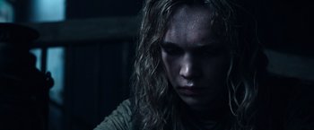 Movie still from “All the Money in the World” (2017), directed by Ridley Scott – A person with long hair; Close Up shot, Low angle